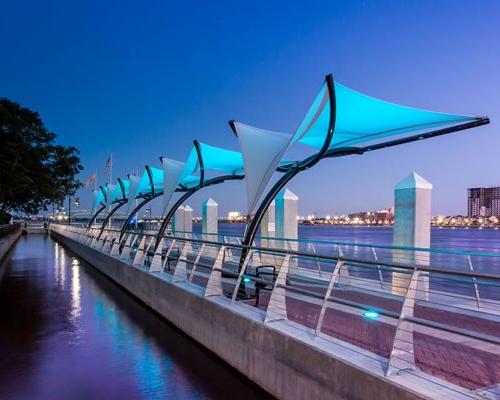 Photo of Jacksonville's 南岸河边漫步 at dusk. 蓝色LED灯照亮了顶篷.